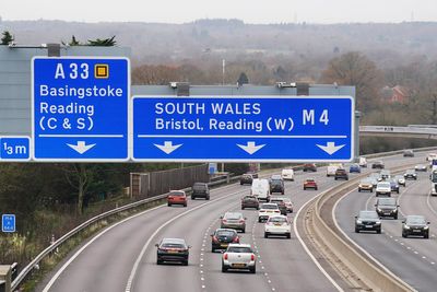 Child dies after minibus overturns on motorway slip road