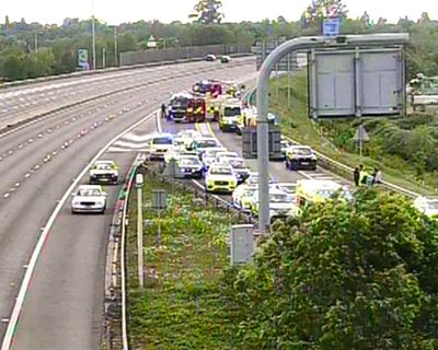 Child dies after minibus overturns on M4 slip road in Berkshire