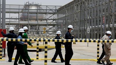 Saudi Arabian oil giant Aramco takes hit due to lagging oil prices