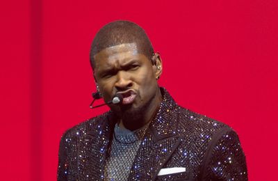 Usher avoids 'emergency' as he attempts to feed fan allergic to cherries at London gig