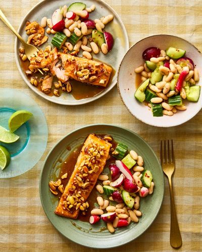 Rukmini Iyer’s quick and easy recipe for soy and peanut trout with smashed cucumber, radishes and beans