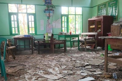 An airstrike in central Myanmar kills up to 22 people at a bombed school, reports say