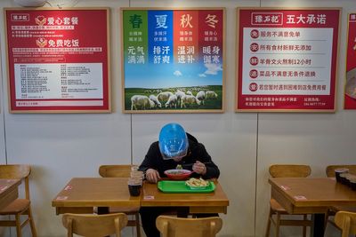 China's army of food delivery drivers get by with help from discount 'loving meals'