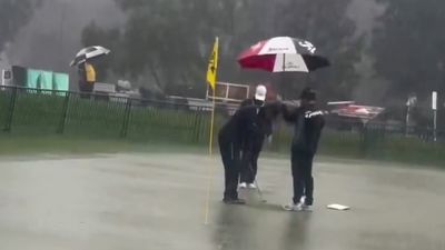 Watch The Bizarre Moment Hideki Matsuyama Works On His Putting In Torrential Rain Ahead Of PGA Championship