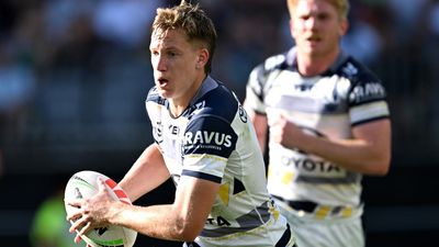 Cowboys axe halfback to take chance on gun teen
