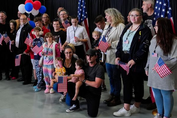 First group of white South Africans arrive in US after Trump grants refugee status