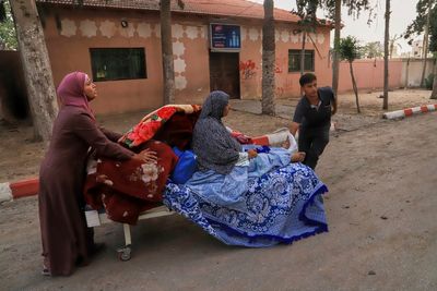 Israeli airstrikes in Gaza kill 48 people, including 22 children, hospitals say