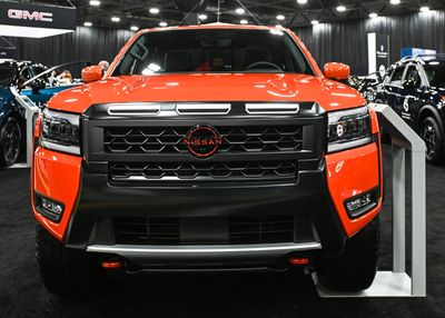 Japanese carmakers slash profit outlooks as they face down U.S. tariffs and Chinese EVs