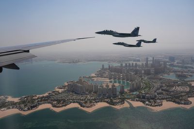 Trump's Qatar trip is off to a flying start as Air Force One gets another fighter jet escort