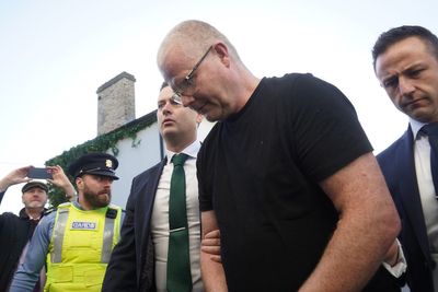 Murder accused says he cut dressing gown belt so he could hold dead wife