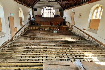 Theatre exposes historic timber floor dubbed ‘dry equivalent of the Mary Rose’