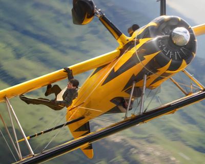 ‘We couldn’t tell if he was conscious’: Tom Cruise got stuck on top of biplane shooting Mission: Impossible sequel
