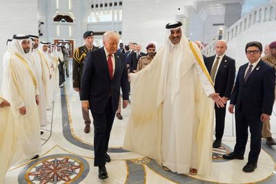 Live updates: Trump visits main U.S. military base in Middle East as violence flares in Gaza