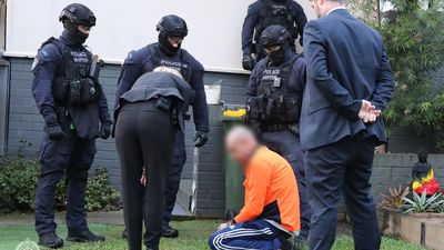 Police storm house over violent home invasion murder