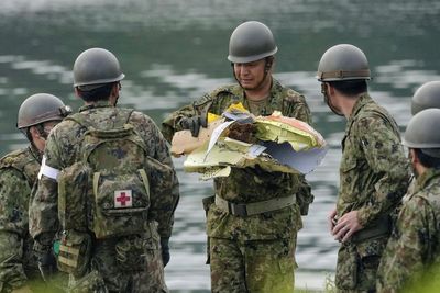 Japan starts emergency inspections on nearly 200 military training planes after crash