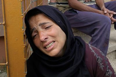 Gaza Air Strikes Kill 94 As Manhunt Unfolds In West Bank
