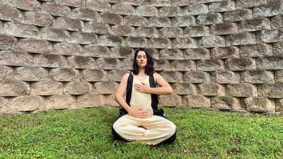 Destress with this five-move seated yoga flow, using the power of your breath
