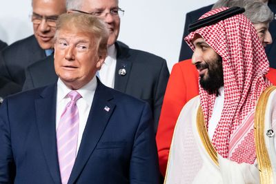 Trump holds a USA yard sale