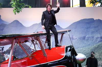 Tom Cruise climbs on planes as he hits red carpet at Mission: Impossible – The Final Reckoning London premiere
