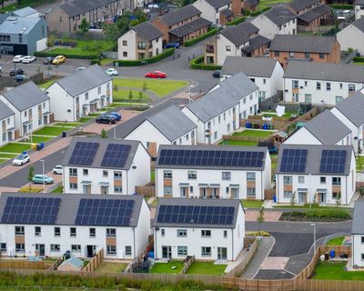 The Guardian view on green homes: solar panels and heat pumps should be a bare minimum