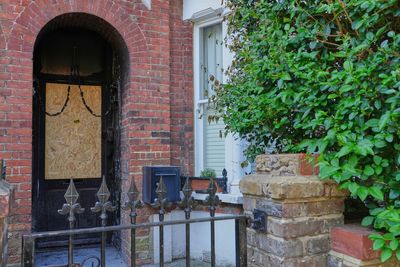 Man charged in fires targeting UK prime minister's properties held in custody