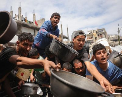 Trump acknowledges starvation in Gaza as Israeli airstrikes kill more than 100