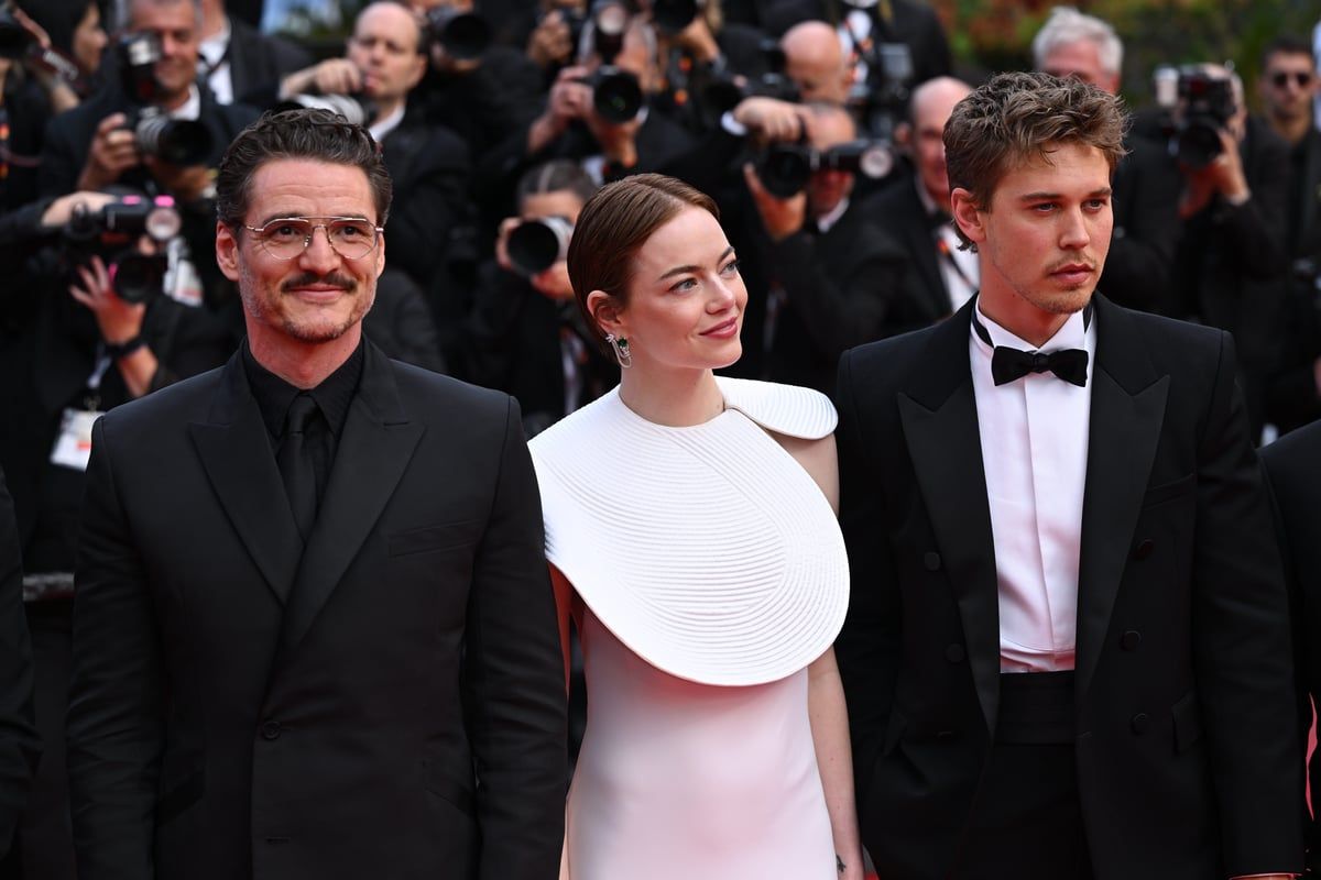 Emma Stone and Pedro Pascal pose on Cannes red carpet…
