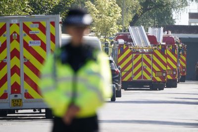 Man and two firefighters killed in fire at former RAF base named