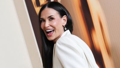 It's true: it doesn't get any chicer than Demi Moore's white turn-up jeans and comfy Teva sandals