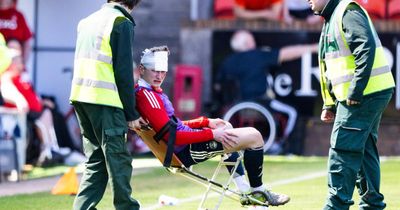 Aberdeen's MacKenzie requires stitches after being hit by seat thrown by supporter