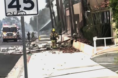 Police and firefighters respond to an explosion rocking the California city of Palm Springs