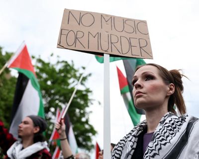 Eurovision crew member hit with paint amid bid to disrupt Israeli performance