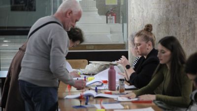 Romanians vote in tense run-off between pro-Trump nationalist and pro-EU centrist