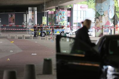 German police search for man who attacked and injured several people outside a bar
