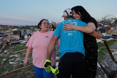 Residents dig out from tornado damage after storms kill 27 in Kentucky, Missouri and Virginia