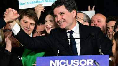 Pro-EU centrist wins tense Romania presidential vote rerun