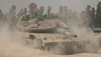 Israel says it will allow 'basic' amount of aid into Gaza as it expands ground offensive
