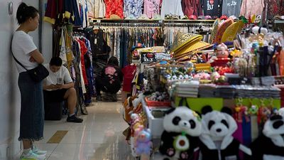 China's economy slows in April as trade war blues hit retail sales and housing