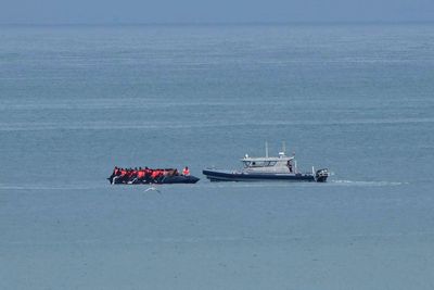 1 person dies when a boat overloaded with migrants sinks in the English Channel