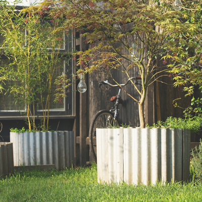 How to fill the bottom of a large planter – 4 household items garden experts use to save time, money and effort