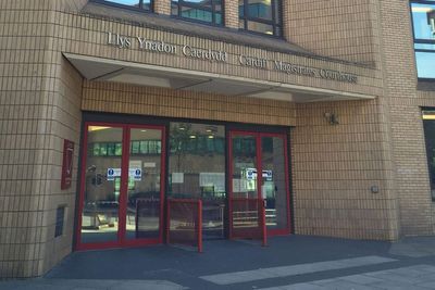 Former MP appears in court charged with harassing ex-wife