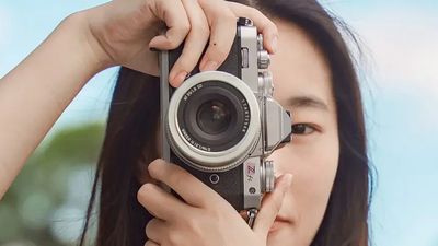 This new silver 35mm lens is making me want a Fujifilm X-Pro1 or Nikon Zfc –because the combination is just so darn cool!