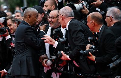 Denzel Washington gets in tense row with photographer on Cannes red carpet
