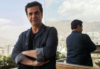 Iran's Panahi Pokes Fun At Iran's Jailers In Cannes Comeback