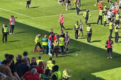 Man charged after Aberdeen player injured by seat thrown from stand