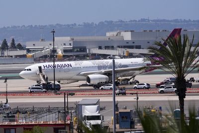 Flight evacuated, 1 arrested following reports of a bomb threat on jetliner at San Diego airport