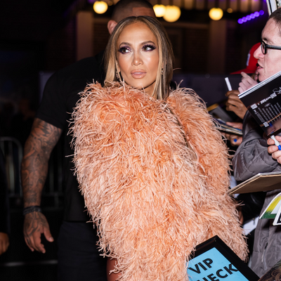 Jennifer Lopez Swaps Her Blush Feathered Look for an Ivory Gown With a Built-In Necklace