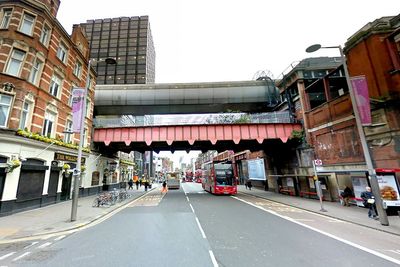Southeastern apologies for daylight-blocking coverings on train station bridge