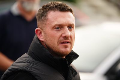 Tommy Robinson charged with harassing two journalists