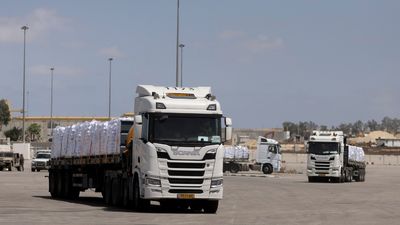 ‘We need it to survive’: Gaza father’s desperate plea goes unanswered as trucks full of aid sit stranded at Israeli crossing